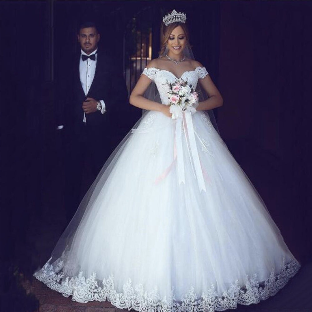 White off the sales shoulder ball gown